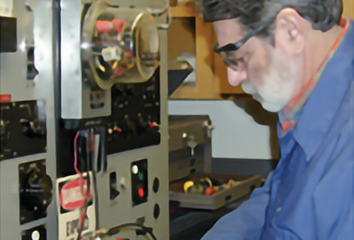 inspector checking device calibration